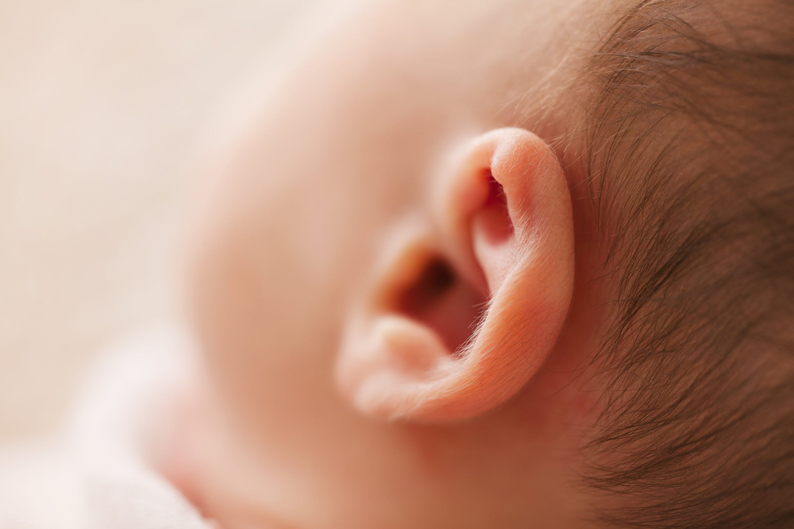 A close up of a baby's ear