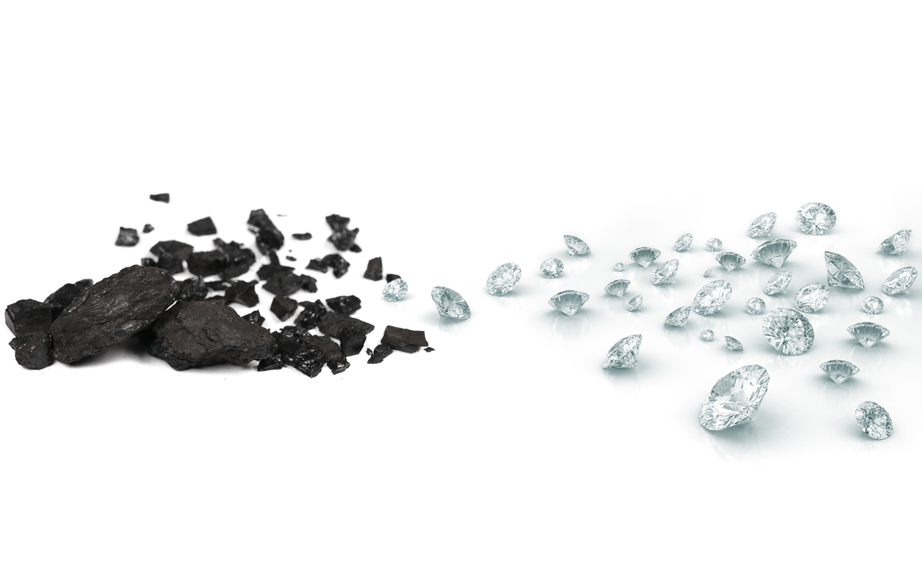 An image of a pile of coal trailing into a pile of diamonds